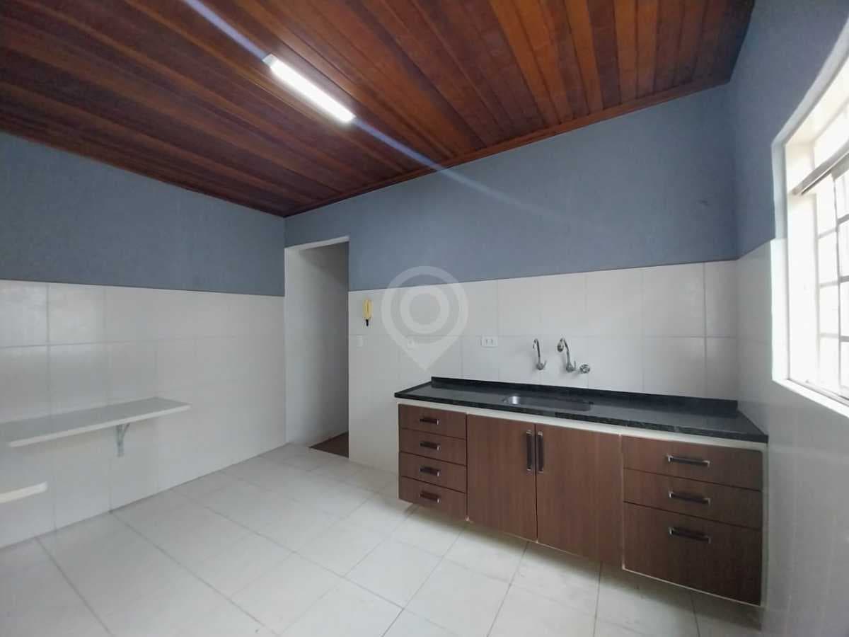 Casa de rua com 1 suíte no Centro — foto 2