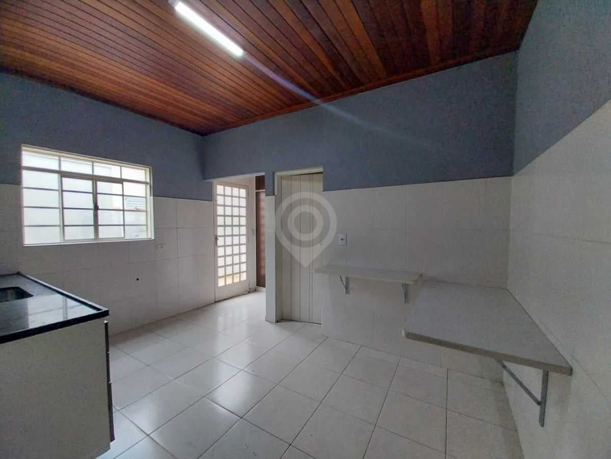 Casa de rua com 1 suíte no Centro